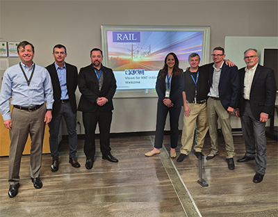 From left: Robert Wilson (FRA), Scott Cummings (MxV Rail), Alex Serdeich (ENSCO), Acacia Reber (ENSCO), Radim Bruzek (ENSCO), Stephen Wilk (MxV Rail), and Mark Patterson (FRA) - TTC Operated by ENSCO - RT&S July 2026