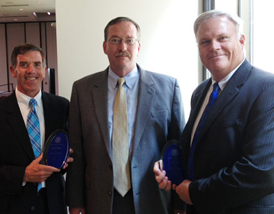 From left: ENSCO's John Sullivan; Kevin McCarthy, Assistant Director, Red Team and Net Assessment Directorate/DNDO; and ENSCO's Dale Jones.